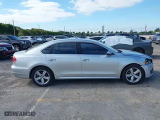 2015 Volkswagen Passat 1.8T Limited Edition with VIN 1VWAS7A35FC090573, listed as a IAAI auction lot 42029286 with 151,451 mi miles. Bid and sale history available at carsss.com. Image 13.