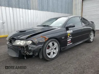 2006 Pontiac GTO with VIN 6G2VX12U06L836591, listed as a Copart auction lot 51596625 with 61,758 mi miles and Salvage Title. Bid and sale history available at carsss.com. Image 1.