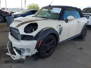 2014 MINI Convertible S with VIN WMWZP3C5XET706911, listed as a IAAI auction lot 42217410 with 54,649 mi miles and . Bid and sale history available at DreamBid. Image 21.