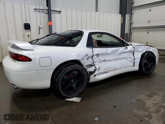 1996 Mitsubishi 3000GT GT z VIN JA3AM84J5TY002387, wystawiony jako Copart lot #64983534 z przebiegiem 149 380 mil mil oraz Szkoda całkowita • Salvage title. Historia ofert i sprzedaży dostępna na DreamBid. Obrazek 3.
