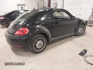 2012 Volkswagen Beetle 2.5L PZEV with VIN 3VWJP7AT3CM623533, listed as a IAAI auction lot 40972471 with 95,906 mi miles. Bid and sale history available at carsss.com. Image 4.