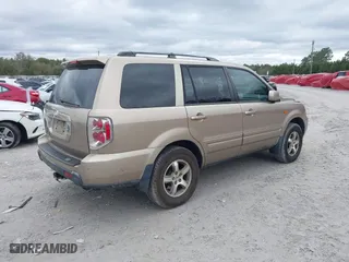 2006 Honda Pilot EX-L with VIN 5FNYF28566B010295, listed as a IAAI auction lot 41654433 with 302,539 mi miles. Bid and sale history available at carsss.com. Image 4.
