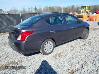 2015 Nissan Versa SV with VIN 3N1CN7AP6FL827678, listed as a IAAI auction lot 41422007 with 164,141 mi miles. Bid and sale history available at carsss.com. Image 4.