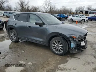 2021 Mazda CX-5 Grand Touring with VIN JM3KFBDM9M0452011, listed as a Copart auction lot 46230945 with 54,825 mi miles and Salvage Title. Bid and sale history available at carsss.com. Image 4.