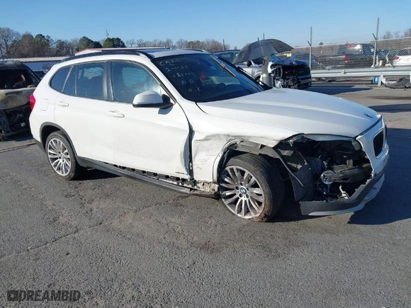 2015 BMW X1 xDrive28i with VIN WBAVL1C50FVY26009, listed as a IAAI auction lot 41495667 with 109,807 mi miles. Bid and sale history available at carsss.com. Image 1.