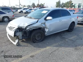 2013 Toyota Corolla L with VIN 2T1BU4EE0DC104010, listed as a IAAI auction lot 41473768 with 67,808 mi miles. Bid and sale history available at carsss.com. Image 2.