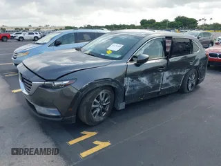 2021 Mazda CX-9 Touring с VIN JM3TCACY4M0511512, выставлен на аукционе IAAI как лот 42376544 с пробегом 50 485 миль миль и . История ставок и продаж доступна на DreamBid. Изображение 17.