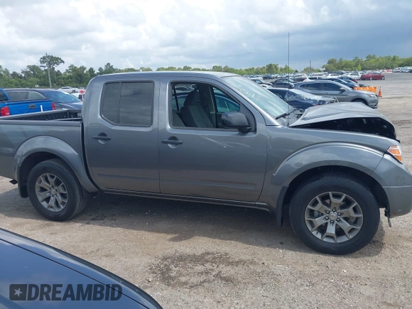 2020 Nissan Frontier SV with VIN 1N6ED0EA3LN715094, listed as a IAAI auction lot 42394885 with 26,576 mi miles and . Bid and sale history available at DreamBid. Image 13.