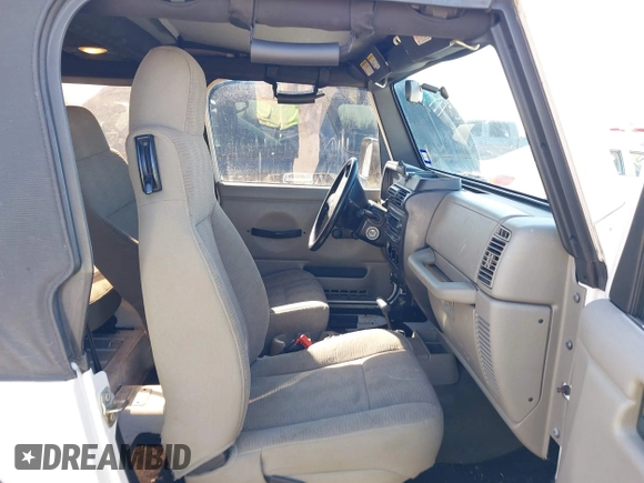 2005 Jeep Wrangler SE with VIN 1J4FA29S95P363770, listed as a IAAI auction lot 41362056 with 140,540 mi miles. Bid and sale history available at carsss.com. Image 5.