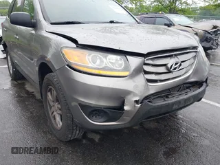 2011 Hyundai Santa Fe GLS z VIN 5XYZGDAB1BG027604, wystawiony jako IAAI lot #42219358 z przebiegiem 145 948 mil mil oraz . Historia ofert i sprzedaży dostępna na DreamBid. Obrazek 1.
