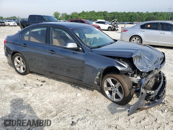 2014 BMW 3 Series 328i with VIN WBA3A5G50ENP33259, listed as a Copart auction lot 57330615 with 217,779 mi miles and Salvage title. Bid and sale history available at DreamBid. Image 4.