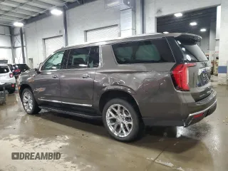 2021 GMC Yukon XL SLT with VIN 1GKS2GKD1MR434218, listed as a Copart auction lot 82777494 with 60,601 mi miles and Salvage Title. Bid and sale history available at carsss.com. Image 2.