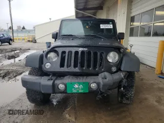 2014 Jeep Wrangler Unlimited Sport with VIN 1C4BJWDG2EL319714, listed as a Copart auction lot 47924575 with 129,294 mi miles and Salvage Title. Bid and sale history available at DreamBid. Image 5.