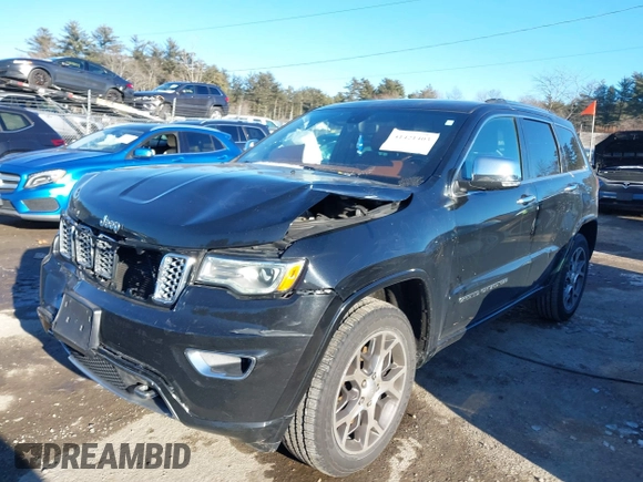 2021 Jeep Grand Cherokee Overland with VIN 1C4RJFCG3MC601150, listed as a IAAI auction lot 41421403 with 165,614 mi miles and . Bid and sale history available at DreamBid. Image 17.
