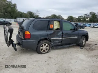 2006 GMC Envoy SLE with VIN 1GKDS13S562135135, listed as a Copart auction lot 88353995 with 159,251 mi miles and Salvage Title. Bid and sale history available at carsss.com. Image 3.