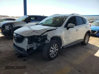 2015 Mazda CX-5 Touring with VIN JM3KE2CY2F0478167, listed as a Copart auction lot 52772805 with 135,492 mi miles and Salvage Title. Bid and sale history available at carsss.com. Image 1.
