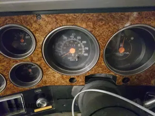 1991 GMC Suburban z VIN 1GKEV16K5MF500359, wystawiony jako Copart lot #81125224 z przebiegiem 177 181 mil mil oraz Tytuł czysty. Historia ofert i sprzedaży dostępna na DreamBid. Obrazek 9.