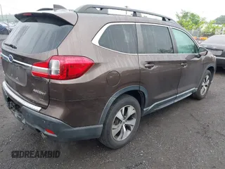 2019 Subaru Ascent Premium with VIN 4S4WMAFD9K3413983, listed as a IAAI auction lot 42257670 with 64,087 mi miles and . Bid and sale history available at DreamBid. Image 4.
