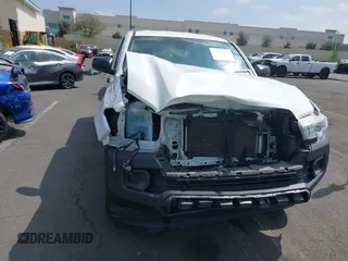 2020 Toyota Tacoma SR with VIN 3TYRX5GN0LT001284, listed as a IAAI auction lot 41888761 with 52,466 mi miles and . Bid and sale history available at DreamBid. Image 6.