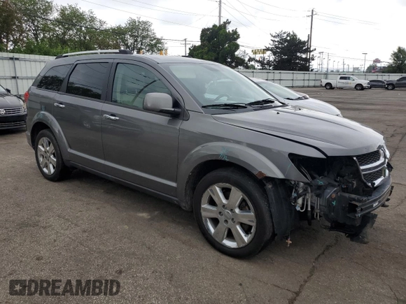 2012 Dodge Journey Crew with VIN 3C4PDDDG6CT275610, listed as a Copart auction lot 57063865 with 126,319 mi miles and Salvage title. Bid and sale history available at DreamBid. Image 4.