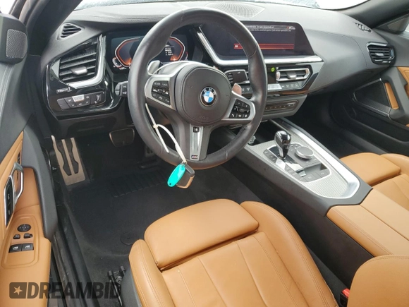 2022 BMW Z4 sDrive30i z VIN WBAHF3C06NWX82076, wystawiony jako Copart lot #75177644 z przebiegiem 2824 mil mil oraz Szkody całkowita. Historia ofert i sprzedaży dostępna na DreamBid. Obrazek 8.