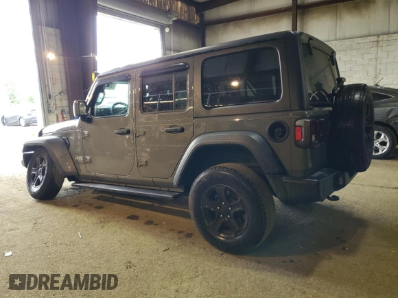 2020 Jeep Wrangler Unlimited Black and Tan with VIN 1C4HJXDG9LW331418, listed as a Copart auction lot 56414765 with 125,339 mi miles and Salvage title. Bid and sale history available at DreamBid. Image 2.