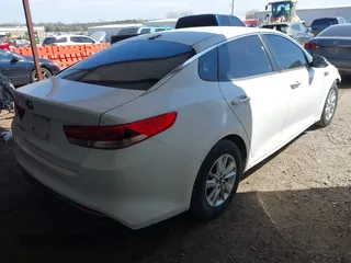 2016 Kia Optima LX with VIN KNAGT4L34G5071506, listed as a IAAI auction lot 41857078 with 72,029 mi miles. Bid and sale history available at carsss.com. Image 4.