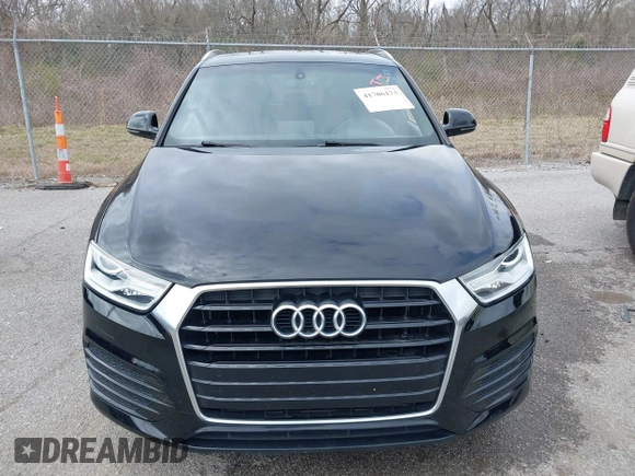 2018 Audi Q3 Premium z VIN WA1BCCFS8JR013032, wystawiony jako IAAI lot #41706173 z przebiegiem 111 402 mil mil oraz . Historia ofert i sprzedaży dostępna na DreamBid. Obrazek 12.