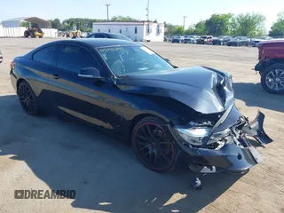 2015 BMW 4 Series 428i xDrive z VIN WBA3N9C59FK248249, wystawiony jako IAAI lot #42140141 z przebiegiem 106 916 mil mil oraz . Historia ofert i sprzedaży dostępna na DreamBid. Obrazek 1.