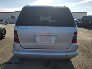2000 Mercedes-Benz M-Class with VIN 4JGAB72E2YA185234, listed as a Copart auction lot 83479684 with 209,491 mi miles and Clean Title. Bid and sale history available at carsss.com. Image 6.