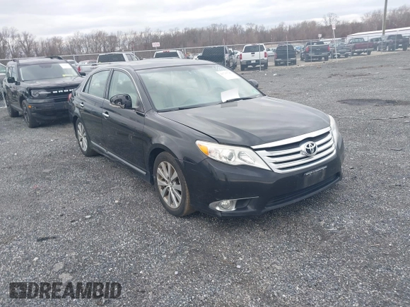 2011 Toyota Avalon with VIN 4T1BK3DB5BU375437, listed as a IAAI auction lot 41715548 with 124,445 mi miles and . Bid and sale history available at carsss.com. Image 1.