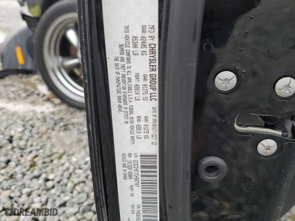2013 Dodge Challenger R/T with VIN 2C3CDYBT7DH567707, listed as a Copart auction lot 65026034 with 97,354 mi miles and Salvage Title. Bid and sale history available at carsss.com. Image 12.