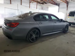 2017 BMW 7 Series 750i with VIN WBA7F0C31HGM22359, listed as a Copart auction lot 56306875 with 90,642 mi miles and Salvage title. Bid and sale history available at DreamBid. Image 3.
