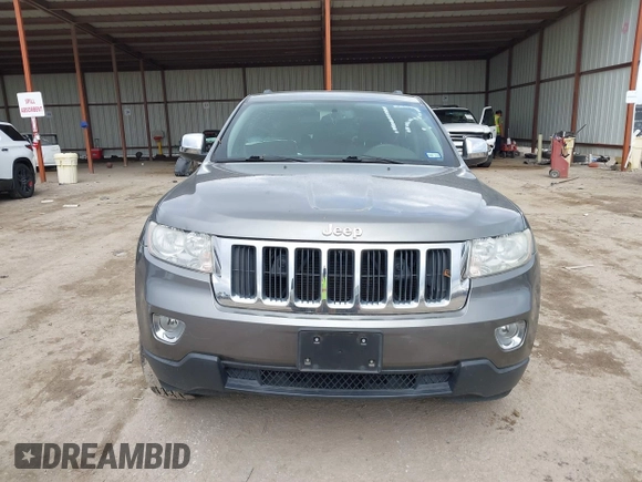 2013 Jeep Grand Cherokee Laredo with VIN 1C4RJEAG2DC571569, listed as a IAAI auction lot 41100518 with 98,265 mi miles. Bid and sale history available at carsss.com. Image 12.