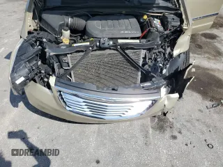 2011 Chrysler Town & Country Limited z VIN 2A4RR6DG5BR746552, wystawiony jako Copart lot #56215685 z przebiegiem 143 505 mil mil oraz Szkoda całkowita • Salvage title. Historia ofert i sprzedaży dostępna na DreamBid. Obrazek 12.