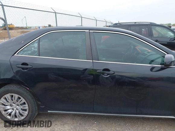 2014 Toyota Camry L with VIN 4T4BF1FK2ER390414, listed as a IAAI auction lot 41936368 with 164,811 mi miles and . Bid and sale history available at DreamBid. Image 13.