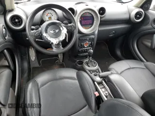 2012 MINI Countryman S with VIN WMWZC3C57CWL86423, listed as a Copart auction lot 57584195 with 102,184 mi miles and Salvage title. Bid and sale history available at DreamBid. Image 8.