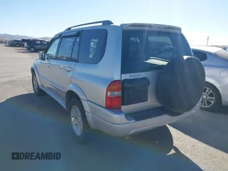 2002 Suzuki XL-7 LX with VIN JS3TY92V824104977, listed as a IAAI auction lot 41494699 with 161,262 mi miles. Bid and sale history available at carsss.com. Image 3.