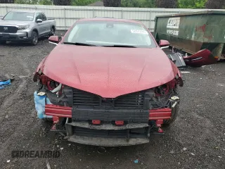 2014 Lincoln MKZ with VIN 3LN6L2JK7ER834055, listed as a Copart auction lot 58043045 with 56,010 mi miles and Salvage title. Bid and sale history available at DreamBid. Image 5.