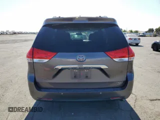 2014 Toyota Sienna Limited with VIN 5TDDK3DC0ES081720, listed as a Copart auction lot 63143875 with 213,928 mi miles and Clean title. Bid and sale history available at DreamBid. Image 6.