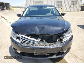 2016 Volkswagen CC Sport z VIN WVWBP7AN6GE513628, wystawiony jako Copart lot #57667775 z przebiegiem 122 302 mil mil oraz Szkody całkowita. Historia ofert i sprzedaży dostępna na DreamBid. Obrazek 5.