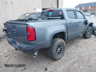 2018 Chevrolet Colorado 4WD ZR2 with VIN 1GCPTEE12J1297871, listed as a IAAI auction lot 41816842 with 101,872 mi miles. Bid and sale history available at carsss.com. Image 4.