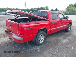 2007 Dodge Dakota SLT with VIN 1D7HW48N17S128373, listed as a IAAI auction lot 42633897 with 129,780 mi miles and . Bid and sale history available at DreamBid. Image 4.