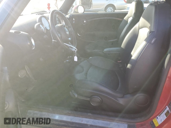 2013 MINI Convertible S with VIN WMWZP3C50DT550554, listed as a Copart auction lot 88415495 with 95,295 mi miles and Salvage title. Bid and sale history available at DreamBid. Image 7.