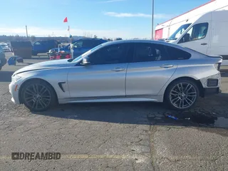 2015 BMW 4 Series 428i with VIN WBA4A5C58FG051293, listed as a IAAI auction lot 41255541 with 60,737 mi miles and . Bid and sale history available at DreamBid. Image 15.