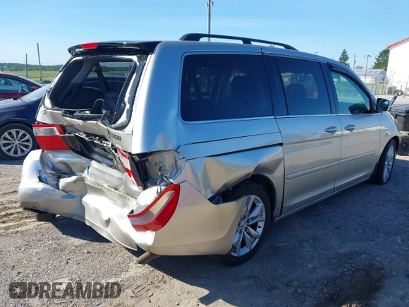 2005 Honda Odyssey EX z VIN 5FNRL38465B411189, wystawiony jako IAAI lot #42310199 z przebiegiem 304 142 mil mil oraz . Historia ofert i sprzedaży dostępna na DreamBid. Obrazek 4.