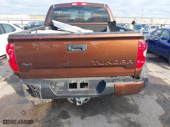 2014 Toyota Tundra 4WD Truck Platinum with VIN 5TFAW5F18EX411578, listed as a IAAI auction lot 41108462 with 150,873 mi miles. Bid and sale history available at carsss.com. Image 16.
