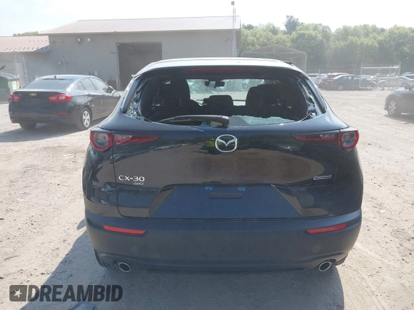 2021 Mazda CX-30 S with VIN 3MVDMBAL6MM264948, listed as a IAAI auction lot 42263077 with 13,614 mi miles and . Bid and sale history available at DreamBid. Image 16.