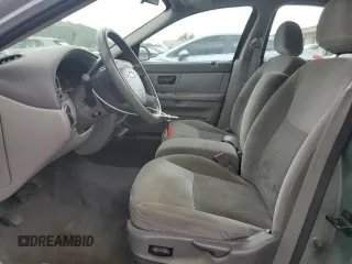 2006 Ford Taurus SE z VIN 1FAFP532X6A186042, wystawiony jako Copart lot #54409375 z przebiegiem 145 687 mil mil oraz Szkody całkowita. Historia ofert i sprzedaży dostępna na DreamBid. Obrazek 7.
