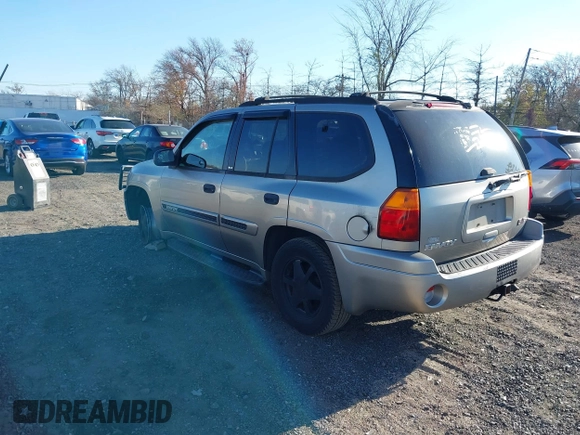 2002 GMC Envoy SLT with VIN 1GKDT13S822304832, listed as a IAAI auction lot 40874054 with 132,883 mi miles. Bid and sale history available at carsss.com. Image 3.